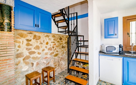 Steps from kitchen takes you to 2 bedrooms